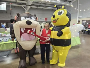 Bumblebee Mascot with the Tazmanian Devil Mascot at the Colorado Mission of Mercy